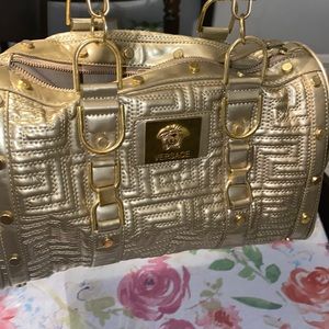 It’s beautiful gold versace Vintage